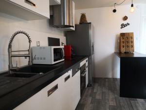 Appartements Groom Epernay - Jacuzzi & Champagne : photos des chambres