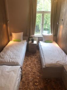 Economy Triple Room with Shared Bathroom room in Villa Kadriorg Hostel