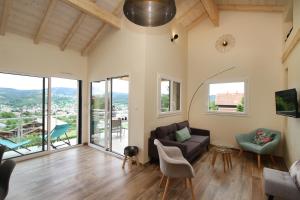 Chalets Le Balcon des Lumieres : photos des chambres