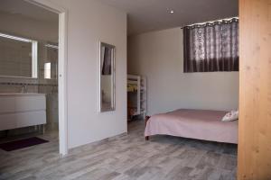Appartements Studio l'Obrador 25 m2, vue jardin & terrasse + acces piscine : photos des chambres