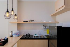 Comfortable Living 1BR at Asatti Apartment By Travelio
