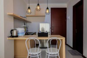 Comfortable Living 1BR at Asatti Apartment By Travelio