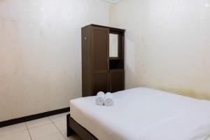 2BR Apartment at 18th Floor Great Western By Travelio