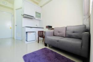 Tranquil 2BR @ Green Pramuka Apartment By Travelio