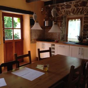 Maisons de vacances La petite maison en pierres : photos des chambres