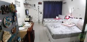 A Cozy fully furnished PRIVATE ROOM IN CONDOMINIUM unit.