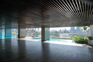 Trendy Studio at Menteng Park Apartment By Travelio