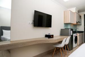 Trendy Studio at Menteng Park Apartment By Travelio