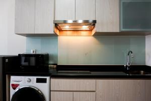 Trendy Studio at Menteng Park Apartment By Travelio