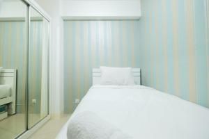 Brand New 2BR at Bassura City Apartment By Travelio