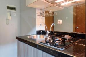 Comfy Studio Apartment Woodland Park Residence By Travelio