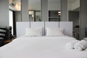 Bright Studio @ Tamansari La Grande Apartment By Travelio