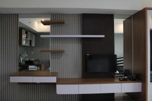 Bright Studio @ Tamansari La Grande Apartment By Travelio