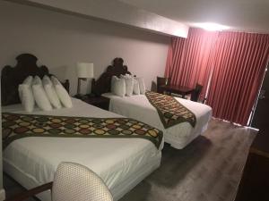 Queen Room with Two Queen Beds room in Alamar Resort Inn