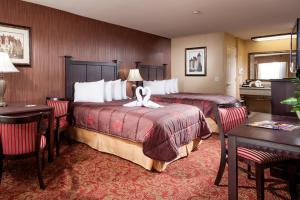 Queen Room with Two Queen Beds room in Castle Inn and Suites Anaheim