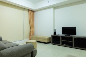 Cozy and Elegant 2BR Kemang Village Apartment By Travelio