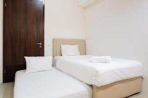 Cozy and Elegant 2BR Kemang Village Apartment By Travelio