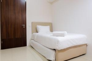 Cozy and Elegant 2BR Kemang Village Apartment By Travelio