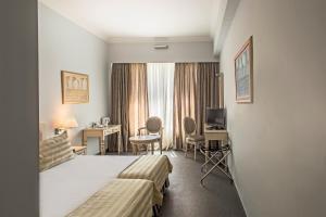 Double Room (2 Adults + 1 Child) room in Airotel Stratos Vassilikos Hotel