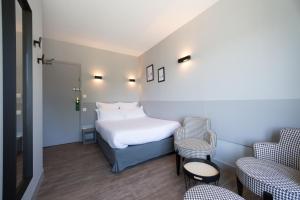 Hotels Logis Les Voiliers : photos des chambres