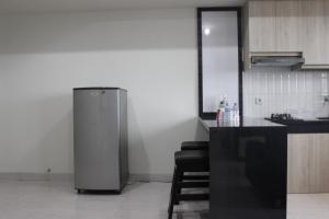 Cozy 2BR Apartment @ Newton Residence By Travelio