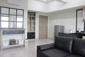 Cozy 2BR Apartment @ Newton Residence By Travelio