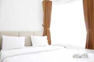 Cozy 2BR Apartment @ Newton Residence By Travelio