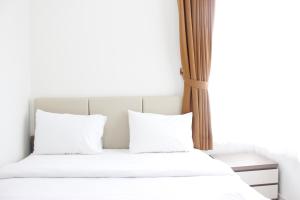 Cozy 2BR Apartment @ Newton Residence By Travelio