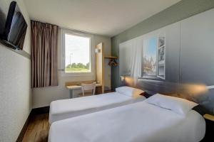 Hotels B&B HOTEL BEAUNE Nord : photos des chambres