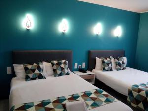 Quadruple Room with Air Conditioning room in Hotel Astoria