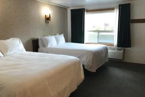 Queen Room with Two Queen Beds room in Downtowner Inn