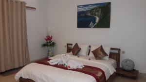 Suite Có Giường Cỡ King Nhìn Ra Hồ Bơi (King Suite with Pool View)