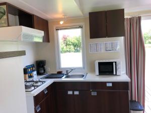 Campings LE MEDOC AUX 4 VENTS : photos des chambres
