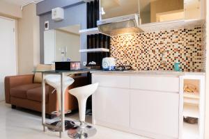 Contemporary 2BR at Bassura City Apartment By Travelio