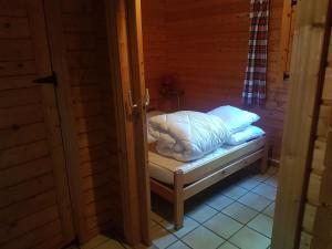 Campings LES CHALETS DE MONTORGUEIL : photos des chambres