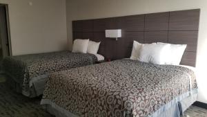 Queen Room with Two Queen Beds - Non-Smoking room in Days Inn & Suites by Wyndham Charleston Airport West