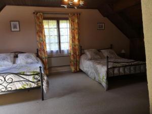 B&B / Chambres d'hotes Au Jardin Fleuri : photos des chambres