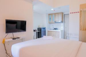 Spacious Studio Akasa Pure Living Apartment BSD By Travelio