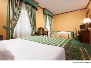 Deluxe Triple Room room in Grand Hotel Trento