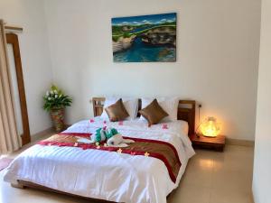 Suite Có Giường Cỡ King Nhìn Ra Hồ Bơi (King Suite with Pool View)