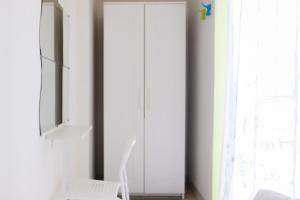 Cozy Studio Serpong Greenview Apartment By Travelio