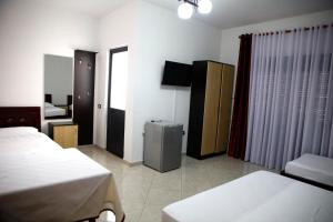 Quadruple Room with Sea View room in Hotel Tirona