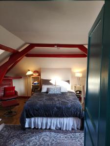 Sejours chez l'habitant La Cour Du Puits, chambre Ophelie : photos des chambres