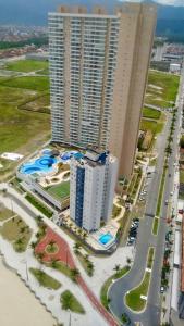 Ap pé na areia frente praia Costa do sol