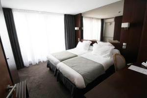 Hotels Hotel des Tonneliers : photos des chambres