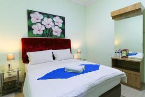 Labuana Homestay and Cafe Garden Makassar