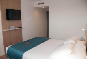 Hotels Kyriad Montpellier Ouest St Jean de Vedas - A709 : photos des chambres