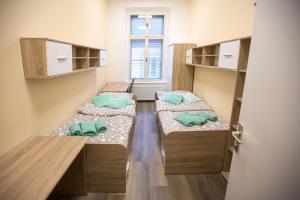 MINIDORM ROOMS IN HEART OF CITY CENTER