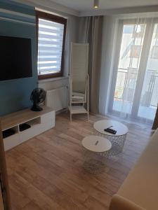 Apartament PRZYTULNIE TU