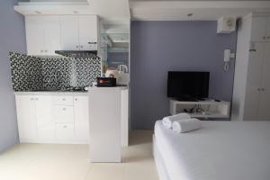 Best Deal Studio Bassura Apartment By Travelio